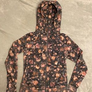 Lululemon Floral Zip Up Hoodie, Size 8, great condition.